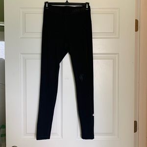 Nike pro, dry fit leggings. Small unnoticeable stain under knee. Size M.